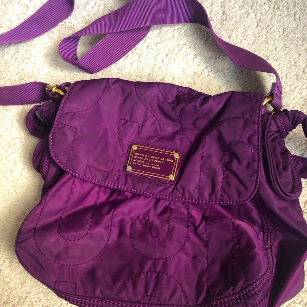 Marc Jacob’s purple quilted work ware canvas crossbody bag